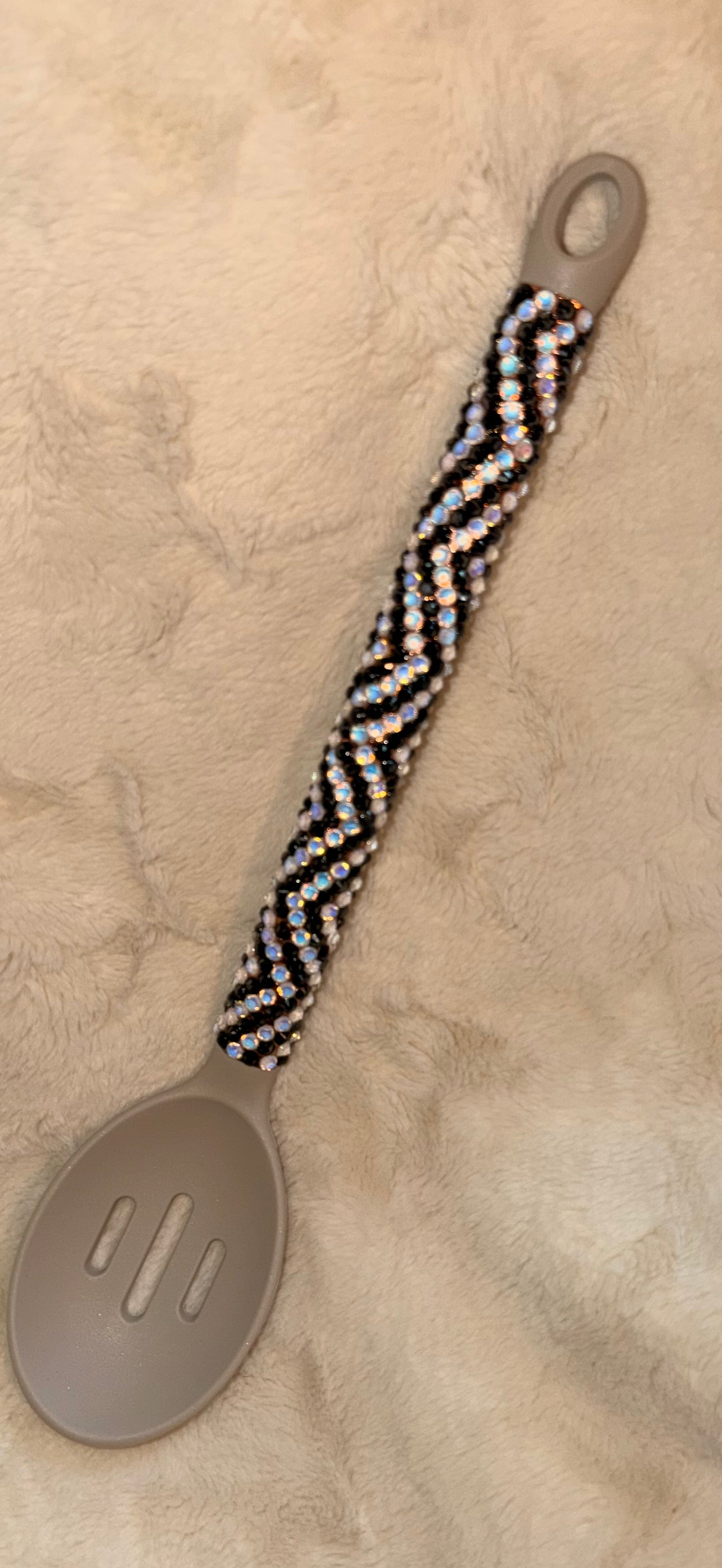 Rhinestone spoon for bomb party